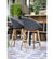 lifestyle, Cane-line Peacock Outdoor Bar Stool in Dark Grey Rope, Teak Legs and Grey Cushion 5455RODGT YSN95