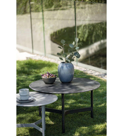lifestyle, Cane-line Twist Large Coffee Table in Lava Grey Aluminum and Black Fossil Ceramic Top 5012AL P90COB
