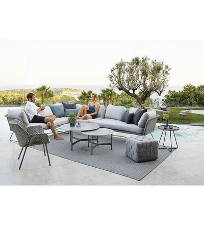lifestyle, Cane-line Twist Large Coffee Table in Light Grey Aluminum and Grey Fossil Ceramic Top 5012AI P90COG