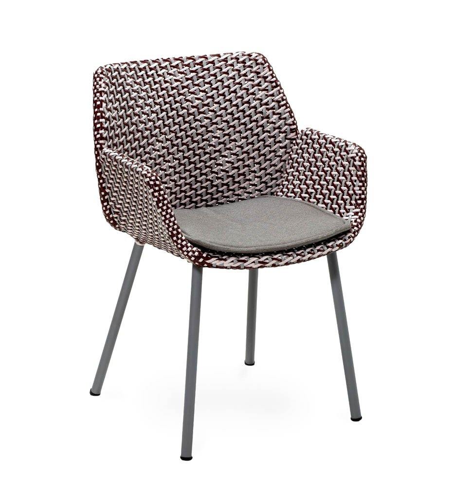 Cane-line Vibe Outdoor Dining Arm Chair in Light Grey, Bordeaux, and Dusty Rose All Weather Weave with Taupe Cushion 5406AIIBRDR YSN97