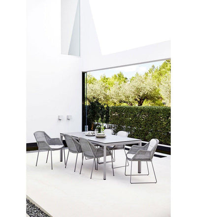 lifestyle, Cane-line Drop Outdoor Dining Table in Light Grey Aluminum Base and Concrete Grey Ceramic Top 50406AI P091CB