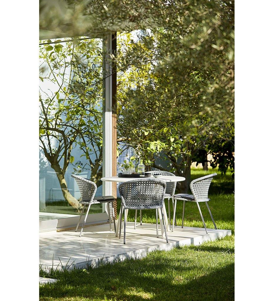 lifestyle, Cane-line Lean Outdoor Dining Chair - Light Grey French Weave All Weather Wicker Rattan 5410FAI