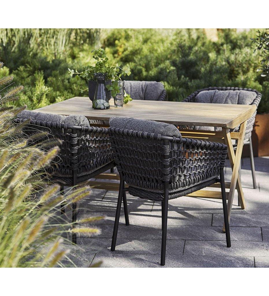 lifestyle, Cane-line Ocean Outdoor Dining Arm Chair with Taupe Rope and Dark Grey Wove Cushions 