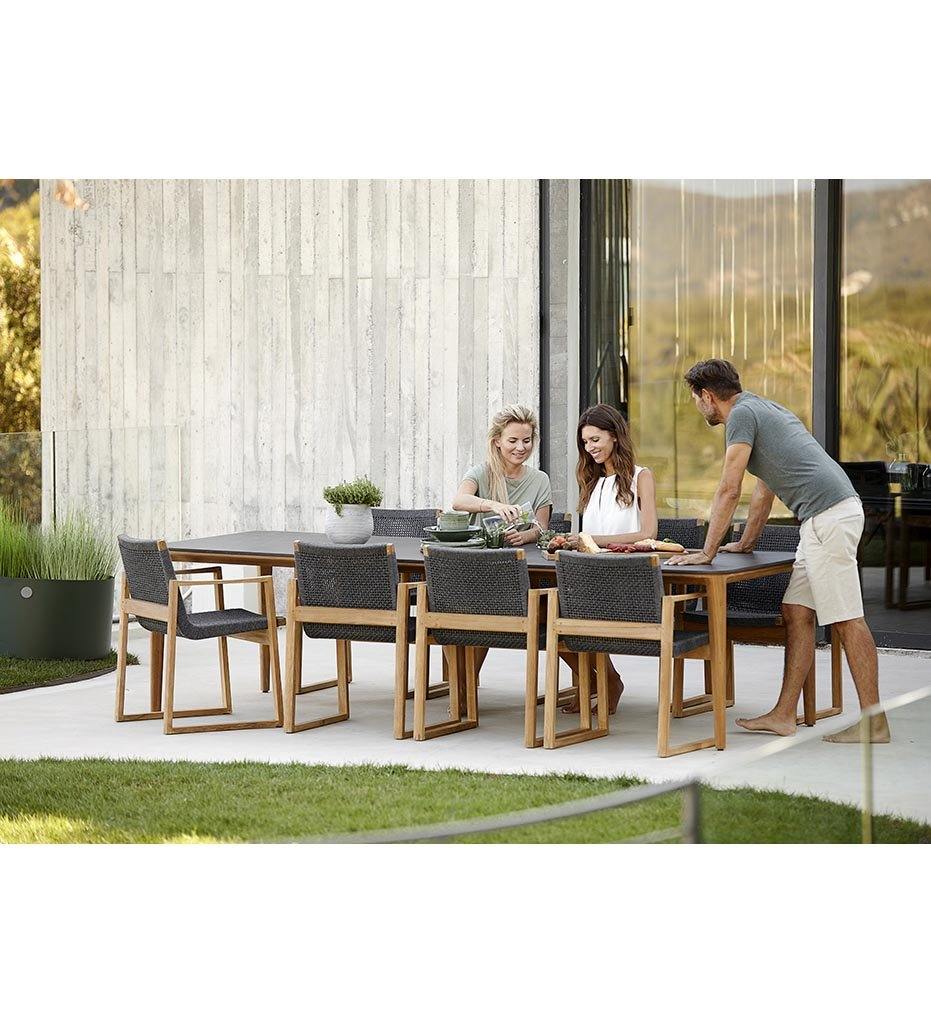 lifestyle, Cane-line Endless Outdoor Dining Arm Chair in Teak and Dark Grey Rope 54501RODGT